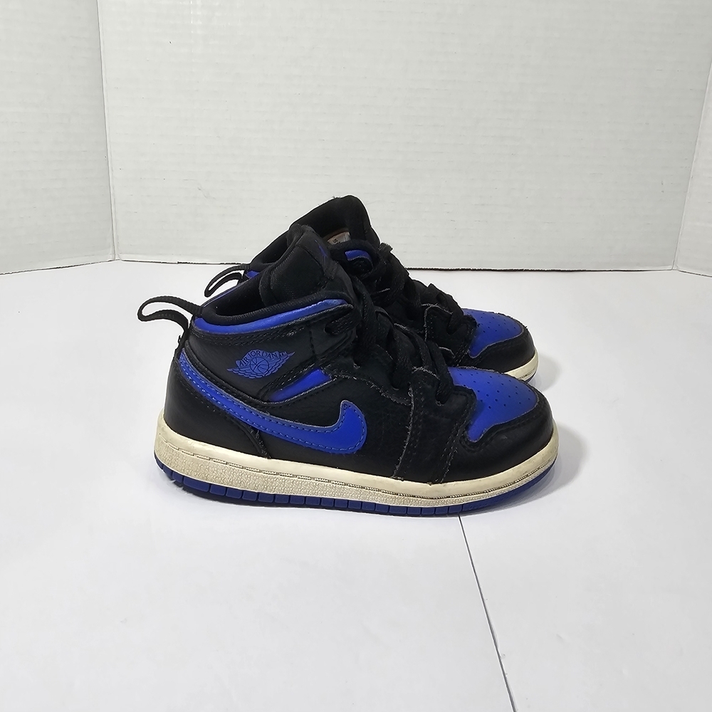 Jordan 1 Mid for baby or toddler, in the black and royal blue color combination